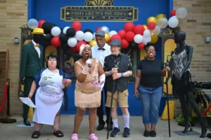A group of people on stage in 1920s themed clothing